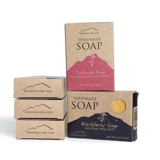Handmade soap bars packaged in kraft paperboard cartons
