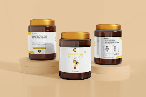 Steps for measuring a honey jar, designing the label, checking the proof, and applying the printed label - Bluebird Packaging
